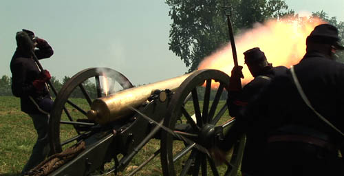 Black soldiers firing cannon